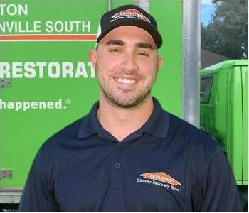 Chandler St. Peter Operations Manager SERVPRO Jacksonville South, male employee in dark hair